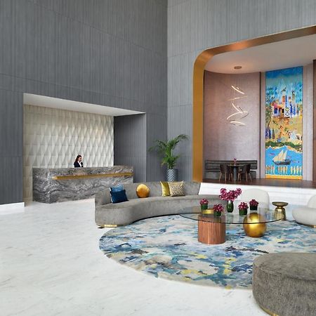 Movenpick Jumeirah Village Triangle Dubái Exterior foto The lobby of the hotel
