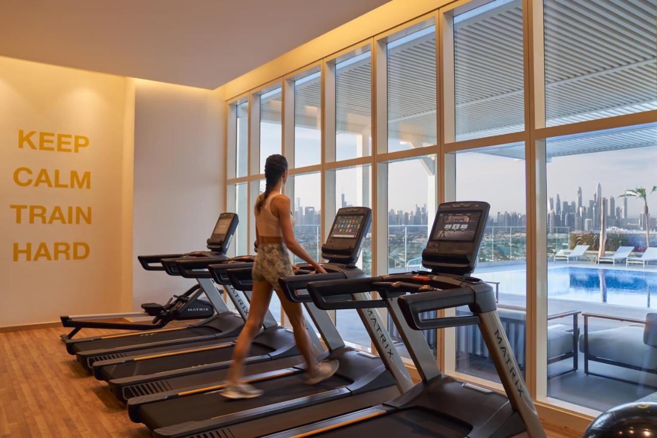 Movenpick Jumeirah Village Triangle Dubái Exterior foto The gym at the hotel