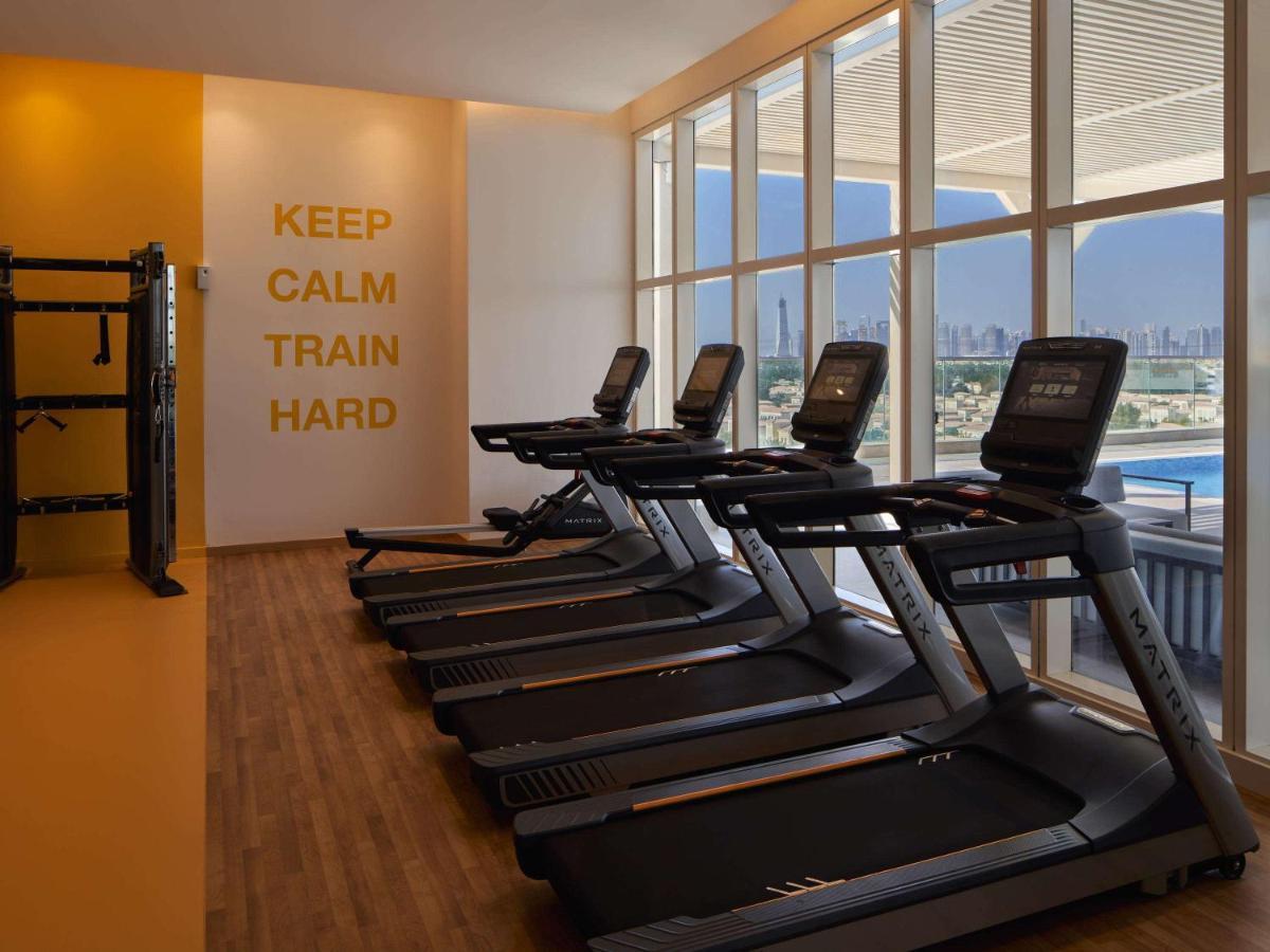 Movenpick Jumeirah Village Triangle Dubái Exterior foto The gym at the hotel
