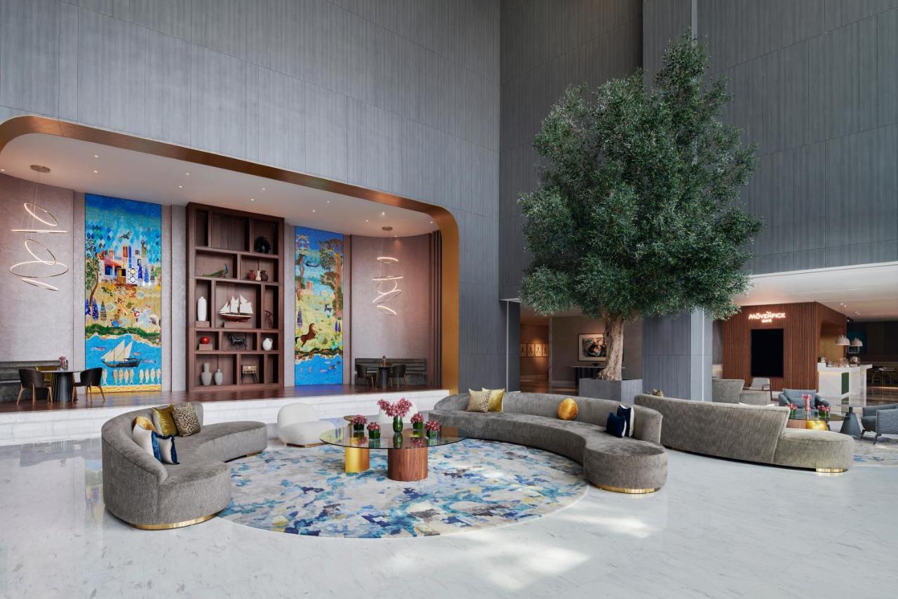 Movenpick Jumeirah Village Triangle Dubái Exterior foto The lobby of the hotel